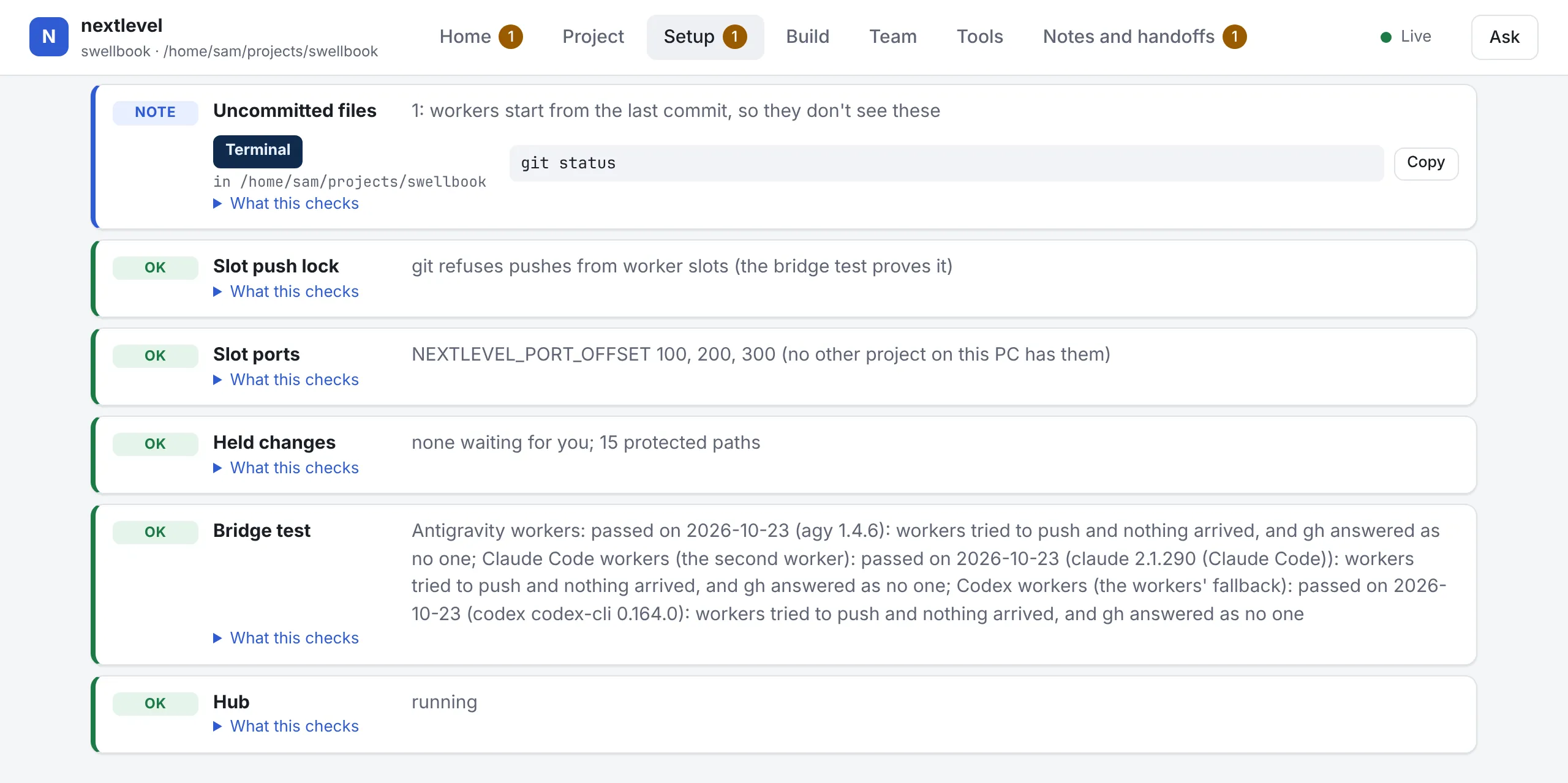 The Setup page's last checks: a note with the command to type and where, with a Copy button; the slot push lock; slot ports; held changes, none waiting; the bridge test, passed for Antigravity, Claude Code and Codex workers; and the hub, running.